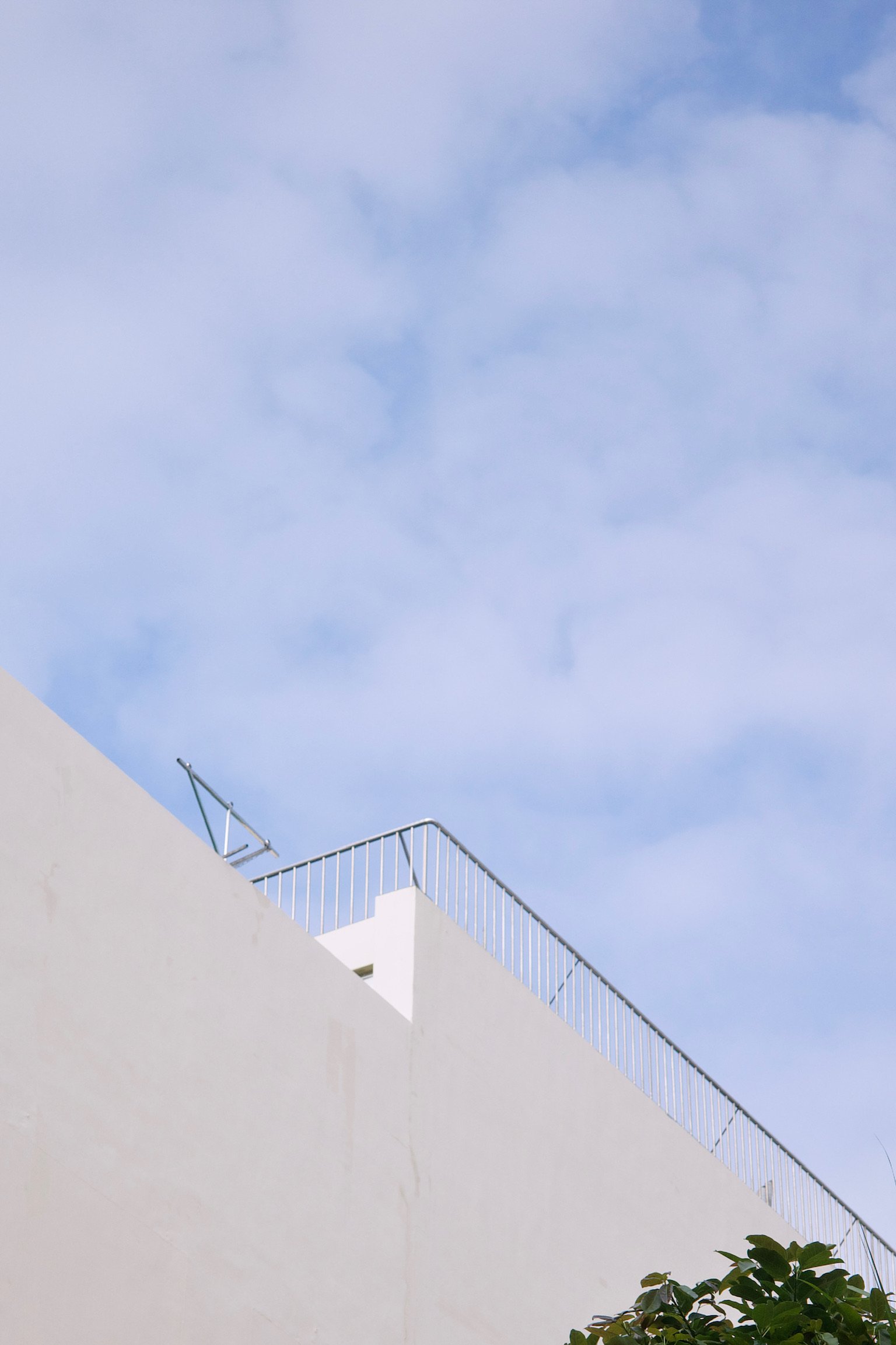 a white building with a railing