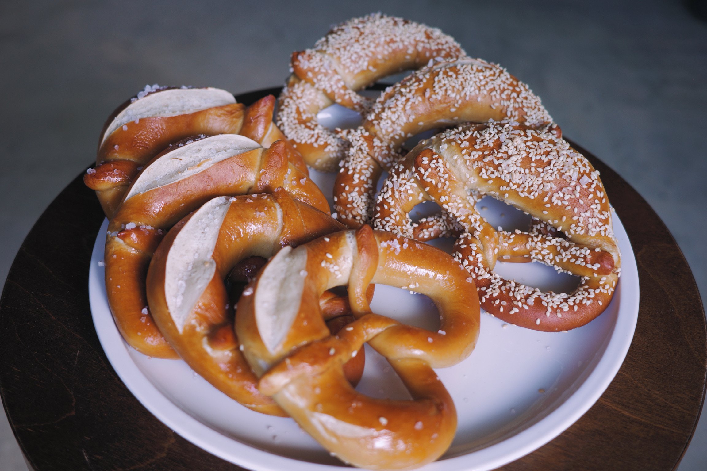 Plate of pretzels, four original, three sesame.