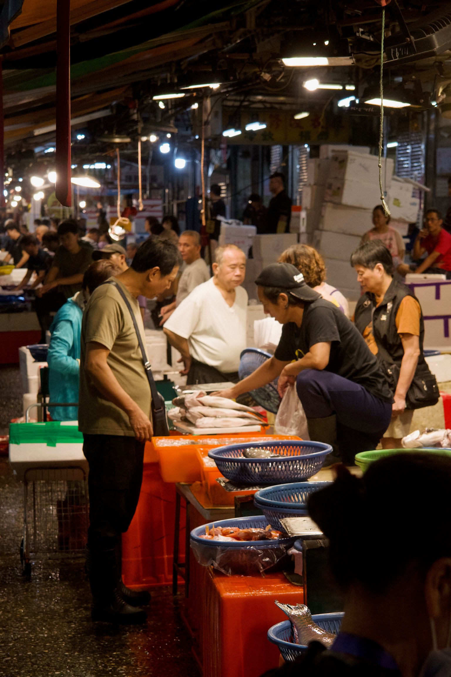 a group of people at a market