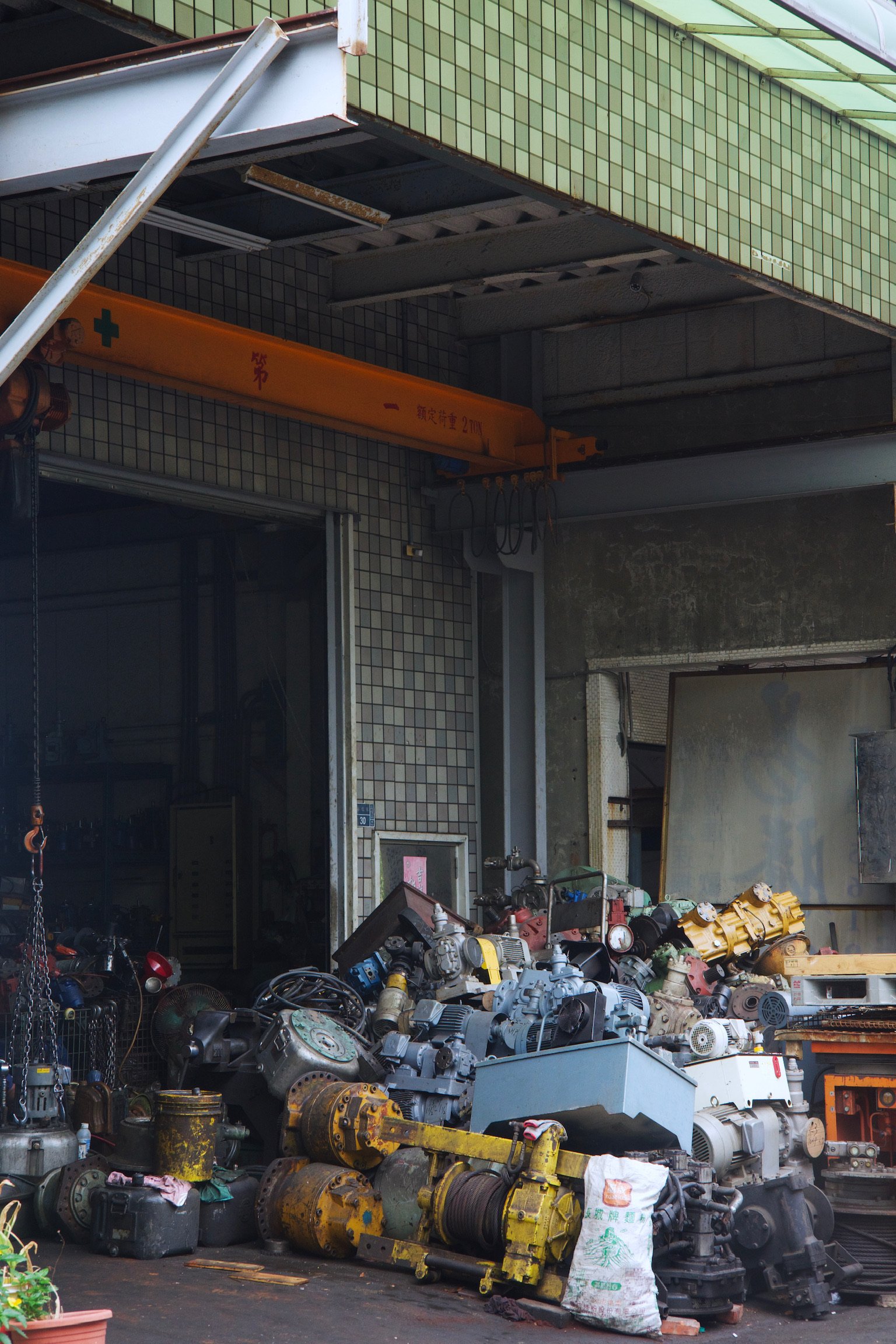 a large pile of machinery in a warehouse